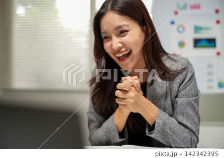 Successful Businesswoman Reacting with Surprise in Office Successful Businesswoman Reacting with Surprise in Office 142342395