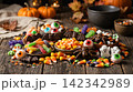 colorful candies in a bucket and a burning 142342989