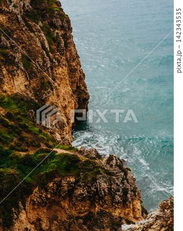 Dramatic Coastal Cliffs and Turquoise Atlantic Ocean Dramatic Coastal Cliffs and Turquoise Atlantic Ocean 142343535