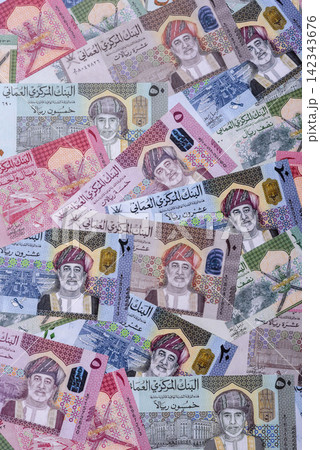 Oman, omani paper money, rial or riyal banknotes and coins as currency for exchange. Omani money Oman, omani paper money, rial or riyal banknotes and coins as currency for exchange. Omani money 142343676