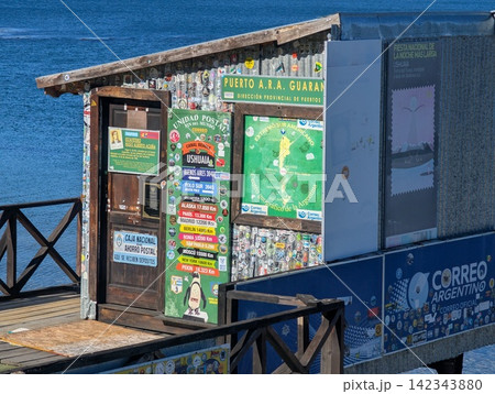 Ushuaia, Tierra del Fuego, Argentina - March 7, 2026: Unidad Postal Fin del Mundo at Puerto A.R.A. Guarani. Ushuaia, Tierra del Fuego, Argentina - March 7, 2026: Unidad Postal Fin del Mundo at Puerto A.R.A. Guarani. 142343880