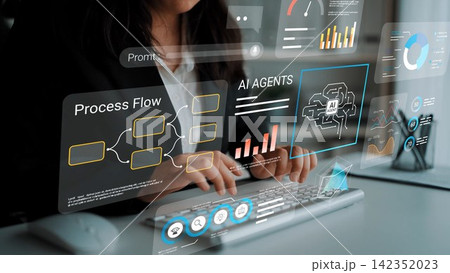 Professional woman using computer with virtual AI interface showcasing data analytics, charts, and process flow in modern workspace environment Gluon 142352023