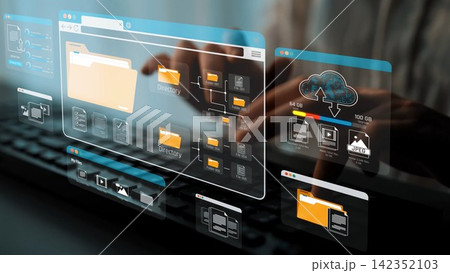A conceptual image showcasing a digital workspace with a virtual file management system and cloud storage interface, highlighting user interaction on a keyboard for efficient organization. Sigmoid A conceptual image showcasing a digital workspace with a virtual file management system and cloud storage interface, highlighting user interaction on a keyboard for efficient organization. Sigmoid 142352103