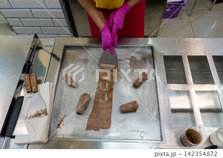 Thai Stir Fried Ice Cream Rolls Making Process on Cold Plate Machine Thai Stir Fried Ice Cream Rolls Making Process on Cold Plate Machine 142354872