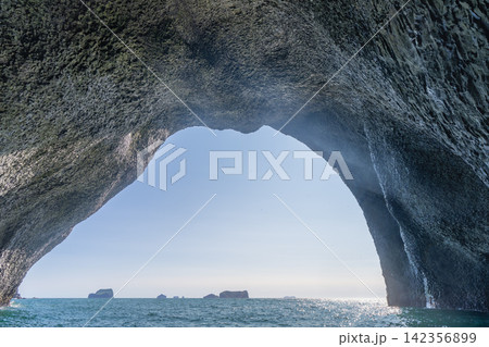 Stunning View from Inside a Sea Cave in Westman Islands, Iceland Stunning View from Inside a Sea Cave in Westman Islands, Iceland 142356899
