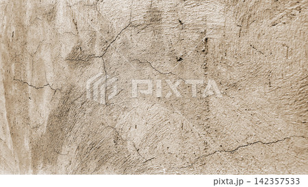 Cream colored plaster wall texture with cracks Cream colored plaster wall texture with cracks 142357533