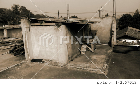 A simple concrete shack on the roof. A simple concrete shack on the roof. 142357615