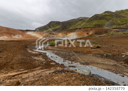 Seltun with a broad mineral valley crossed by a pale channel, Reykjanes Peninsula, Iceland Seltun with a broad mineral valley crossed by a pale channel, Reykjanes Peninsula, Iceland 142358770