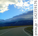 sunset over the road 142359176