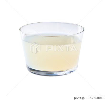 Glass of freshly squeezed lemon juice isolated on white background. glass of lemon juice drink isolated . 142360010