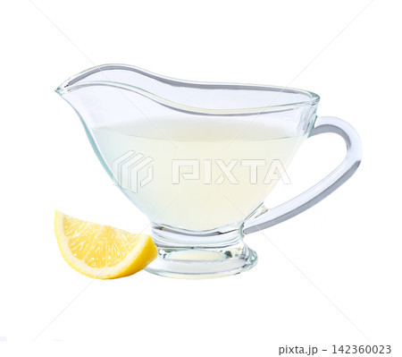 Freshly squeezed lemon juice isolated on white background. Freshly squeezed lemon juice isolated on white background. 142360023