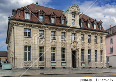 Former General Aargau Savings Bank building with ornate facade statues in Aarau, Switzerland. Cloudy June sky in sunny summer Former General Aargau Savings Bank building with ornate facade statues in Aarau, Switzerland. Cloudy June sky in sunny summer 142360215