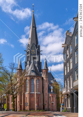 Vondelkerk, Amsterdam, Netherlands, rear view from the apse. Neo-gothic red brick architecture under clear daylight sky 142361584