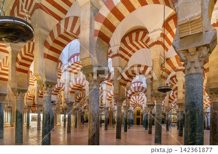 Interior of Mosque Cathedral of Cordoba, Spain. Great Hall with red and white striped arches, historic architecture, no people 142361877