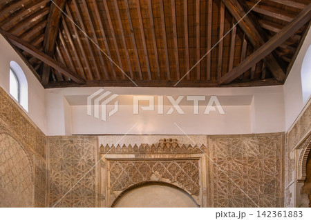 Interior of Cordoba Synagogue wall and ceiling, Spain, close-up view. Mudejar style carvings with natural light, no people 142361883