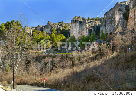 Scenic view of the limestone rocks near Cuenca, Spain, wide angle. Natural geological formations under sunny sky, no people Scenic view of the limestone rocks near Cuenca, Spain, wide angle. Natural geological formations under sunny sky, no people 142361908