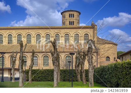 Side view of Basilica of Saint Apollinaris in Classe near Ravenna, Italy. Byzantine architecture and cloudy sky style Side view of Basilica of Saint Apollinaris in Classe near Ravenna, Italy. Byzantine architecture and cloudy sky style 142361959