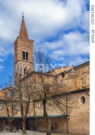 Side view of San Francesco Church and bell tower in Urbino, Italy. Gothic architecture and cloudy sky style 142361962