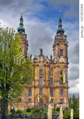 Basilica of the Fourteen Holy Helpers, Germany. Front view of the baroque church facade. Cloudy day with sunny breaks Basilica of the Fourteen Holy Helpers, Germany. Front view of the baroque church facade. Cloudy day with sunny breaks 142363269