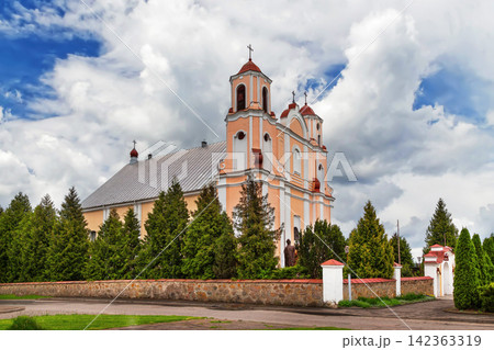 St John the Baptist church in Vasilishki, Belarus. Late baroque architecture style temple under partly cloudy sky St John the Baptist church in Vasilishki, Belarus. Late baroque architecture style temple under partly cloudy sky 142363319