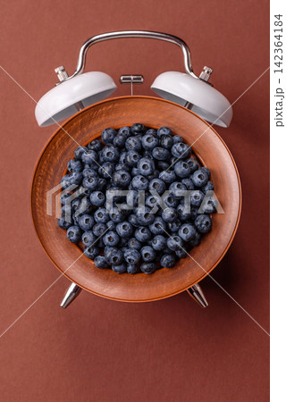 Fresh, ripe, and juicy wild blueberries as an ingredient for vegetarian dishes Fresh, ripe, and juicy wild blueberries as an ingredient for vegetarian dishes 142364184
