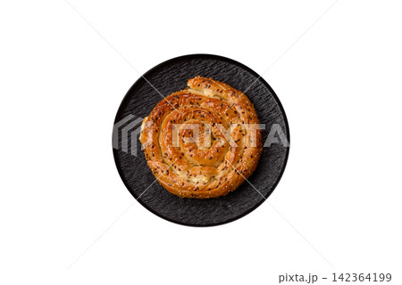 Greek cheese and sesame pie, a traditional Balkan dish. Balkan pie Greek cheese and sesame pie, a traditional Balkan dish. Balkan pie 142364199