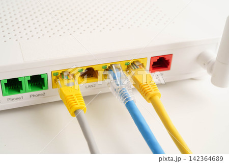 Ethernet cable with wireless router connect to internet service provider network. Ethernet cable with wireless router connect to internet service provider network. 142364689