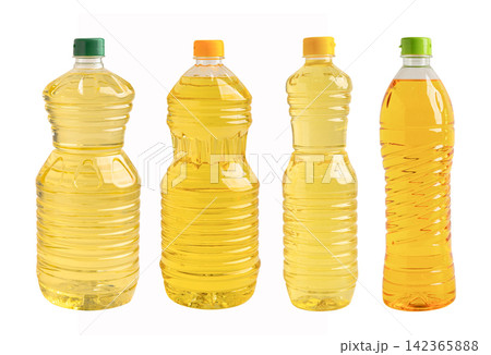 Vegetable oil in bottle isolated on white background. 142365888
