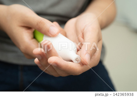 Man holding electronic cigarettes, no smoking. Man holding electronic cigarettes, no smoking. 142365938