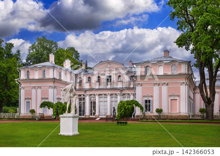 Main facade of Chinese Palace in Oranienbaum, Russia. Front view under a bright summer sky with clouds Main facade of Chinese Palace in Oranienbaum, Russia. Front view under a bright summer sky with clouds 142366053