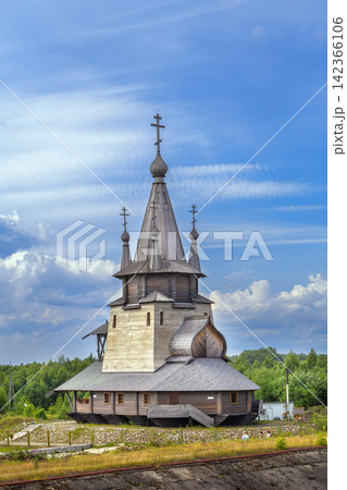 Wooden church of St Nicholas in Povenets, Russia front view. Traditional northern architecture, dark wood 142366106