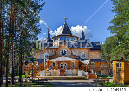 Residence of Ded Moroz in Veliky Ustyug, Russia, scenic view. Traditional Russian wooden palace folk architecture Residence of Ded Moroz in Veliky Ustyug, Russia, scenic view. Traditional Russian wooden palace folk architecture 142366156