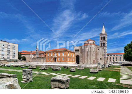 Saint Donatus Church and Roman Forum square in Zadar Croatia wide view. Ancient architecture sunny sky 142366610
