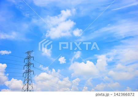 a big electric post with cloudy sky a big electric post with cloudy sky 142366872