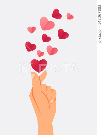 hand making mini heart gesture with paper heart shapes floating above hand making mini heart gesture with paper heart shapes floating above 142367882