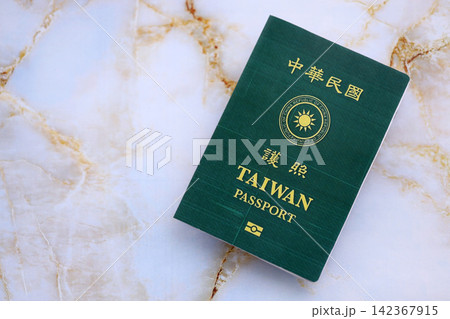 Taiwan passport on table close up. Official identification document book for citizens of Taiwan 142367915