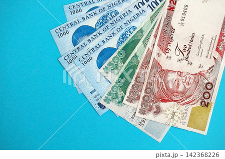 Nigerian naira money bills in big amount. Finance and banking concept Nigerian naira money bills in big amount. Finance and banking concept 142368226