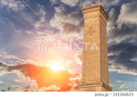 Monument to the People's Heroes at the Tiananmen Square (against the sunset), Beijing, China. Translation of the inscription on the monument: Eternal glory to the people's heroes... 142368625