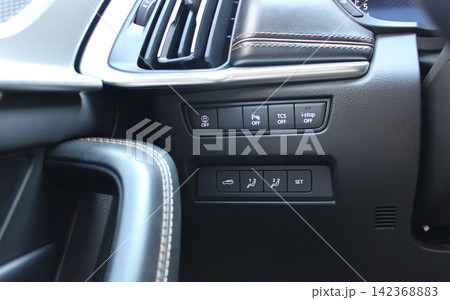 Traction Control, Parking Assistant And Seats Settings Buttons On A Panel Inside Luxury Car Traction Control, Parking Assistant And Seats Settings Buttons On A Panel Inside Luxury Car 142368883