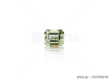 macro mineral faceted stone heliodor, Golden beryl on a white background macro mineral faceted stone heliodor, Golden beryl on a white background 142369248