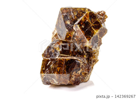 Macro stone Grossular mineral on white background 142369267