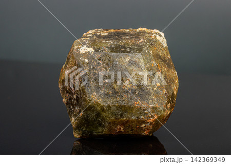 macro mineral stone Andradite on a black background macro mineral stone Andradite on a black background 142369349