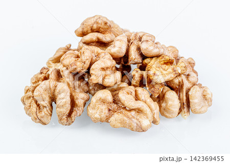 macro juglandaceae nuts, walnut on a white background macro juglandaceae nuts, walnut on a white background 142369455
