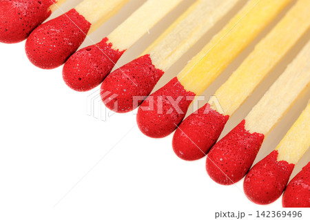 matches with a red head on a white background matches with a red head on a white background 142369496