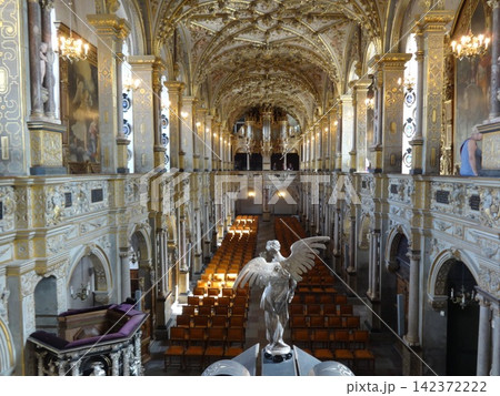 Baroque Church Interior with Ornate Gilded Architecture Baroque Church Interior with Ornate Gilded Architecture 142372222