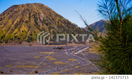 Beautiful morning view of Mount Bromo and Mount Semeru, East Java, Indonesia. Beautiful morning view of Mount Bromo and Mount Semeru, East Java, Indonesia. 142373715