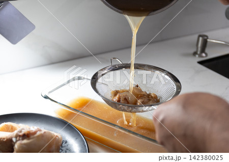 Efficient Bone Broth Preparation: Straining Process for Nutrient-Rich Stock Efficient Bone Broth Preparation: Straining Process for Nutrient-Rich Stock 142380025