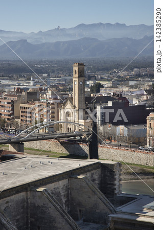 Tortosa cityscape with roser church, ebro river, and mountains Tortosa cityscape with roser church, ebro river, and mountains 142385290