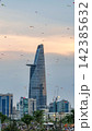 Kites On The Sky With Skyscrapers In Central Of Ho Chi Minh City At Sunset, Vietnam. 142385632