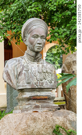 Bust Of Petrus Truong Vinh Ky At A Catholic Monastery In Ho Chi Minh City, Vietnam. Bust Of Petrus Truong Vinh Ky At A Catholic Monastery In Ho Chi Minh City, Vietnam. 142385750